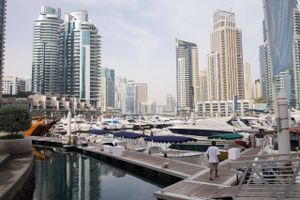 Luxury motor vessels and yachts sit in the harbor at Dubai Marina in Dubai, United Arab Emirates, on Sunday, May 8, 2016. A combination of an oil crisis battering Gulf neighbors and weaker currencies affecting major overseas property investors risk taking the gloss off the Persian Gulf city. m Photo: Razan Alzayani/Bloomberg