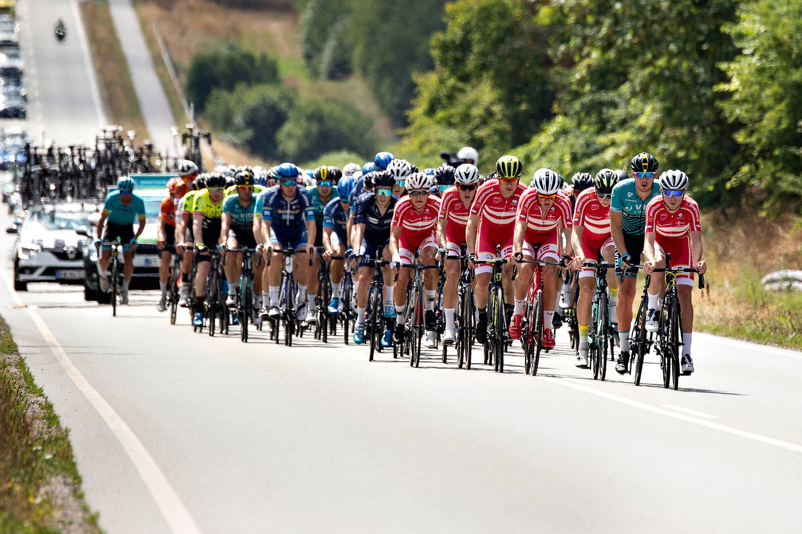 PostNord Danmark Rundt er det største løb i kalenderen for de danske hold. Med en opgradering til pro-kontinental kan det ændre sig.  Foto: Ritzaufoto, Henning Bagger