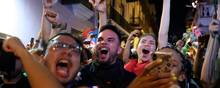 Der blev fejret i gaderne i San Juan i Puerto Rico, da guvernør Ricardo Rosselló annoncerede sin afgang. Foto: Joe Raedle/AFP