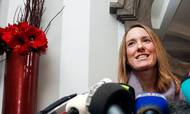 Retired Belgian tennis player Justine Henin addresses a news conference in Brussels February 14, 2011.Former world number one Henin has quit tennis, for a second time, after doctors advised her to end her career due to an injured elbow. REUTERS/Thierry Roge (BELGIUM - Tags: SPORT TENNIS)