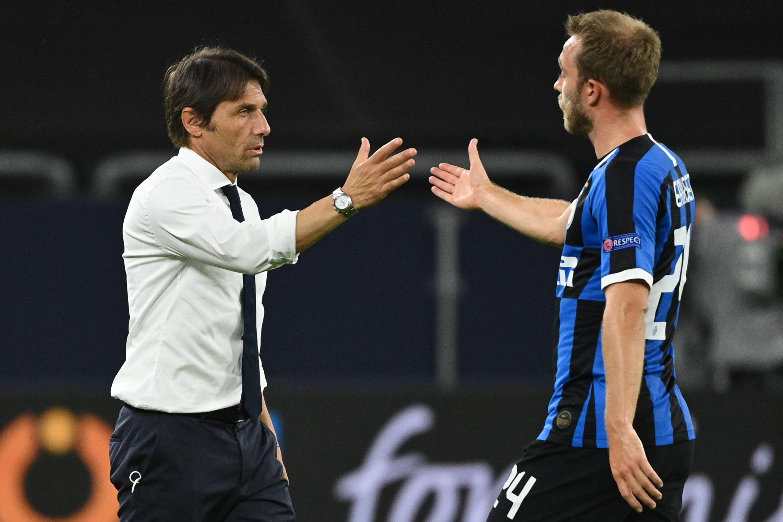 Inters træner Antonio Conte og Christian Eriksen. Foto: Ina Fassbender/Ritzau Scanpix