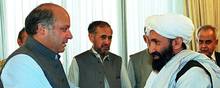 Den nye leder af regeringen, Mullah Mohammad Hassan Akhund (t.h.), er på FN’s sanktionsliste. Foto: SAEED KHAN / AFP)