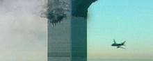 An aircraft at right about to fly into the the World Trade Center in New York in this image made from television, Tuesday Sept. 11, 2001. The aircraft was the second  to fly into the tower Tuesday morning. (AP Photo/ABC)  USA OUT TV OUT  NO CBC