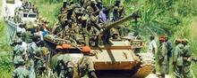 Billedet her er fra maj 2003 og viser styrker fra Uganda, der vender hjem efter at have været i DR Congo under konflikten for omkring to årtier siden. Arkivfoto: Peter Busomoke/AFP