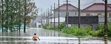 Oversvømmelser i det østlige Kina. Hvis den globale opvarmning når 1,5 grader inden 2040, vil det også "uundgåeligt" føre til flere klimafarer såsom oversvømmelser. Arkivfoto: Hector Retamal/Ritzau Scanpix