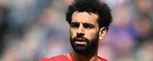 Liverpool's Egyptian midfielder Mohamed Salah reacts during the English Premier League football match between Newcastle United and Liverpool at St James' Park in Newcastle-upon-Tyne, north east England on April 30, 2022. (Photo by Paul ELLIS / AFP) / RESTRICTED TO EDITORIAL USE.No use with unauthorized audio, video, data, fixture lists, club/league logos or 'live' services. Online in-match use limited to 120 images. An additional 40 images may be used in extra time.No video emulation. Social media in-match use limited to 120 images. An additional 40 images may be used in extra time.No use in betting publications, games or single club/league/player publications. /