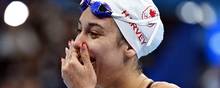 Canadiske Mary-Sophie Harvey, som her ses i bassinet under OL i Tokyo sidste år, oplyser på Instagram, at hun har været udsat for en forfærdelig oplevelse ved det netop overståede VM i svømning. Foto: Attila Kisbenedek/Ritzau Scanpix
