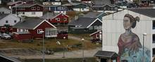 Knap en tredjedel af Grønlands hjemløse er i Nuuk, som kan ses på billedet. Arkivfoto: Hannibal Hanschke/Reuters