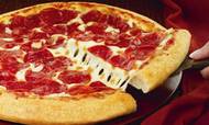 Der er godt gang i forretningen og aktiekursen hos de største amerikanske pizzavirksomheder. Foto: Pizza Hut Foto: Pizza Hut /AP