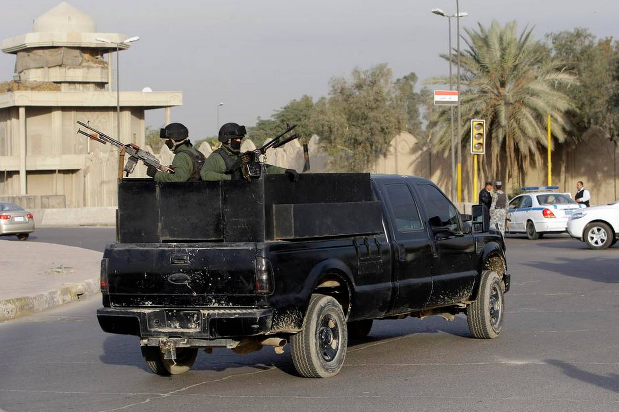 Blackwater patruljerer i Bagdad. Der forelå en aftale mellem Danmark og Blackwater om assistance, hvis danske konvojer kom i problemer. Foto: AP Photo/Khalid Mohammed