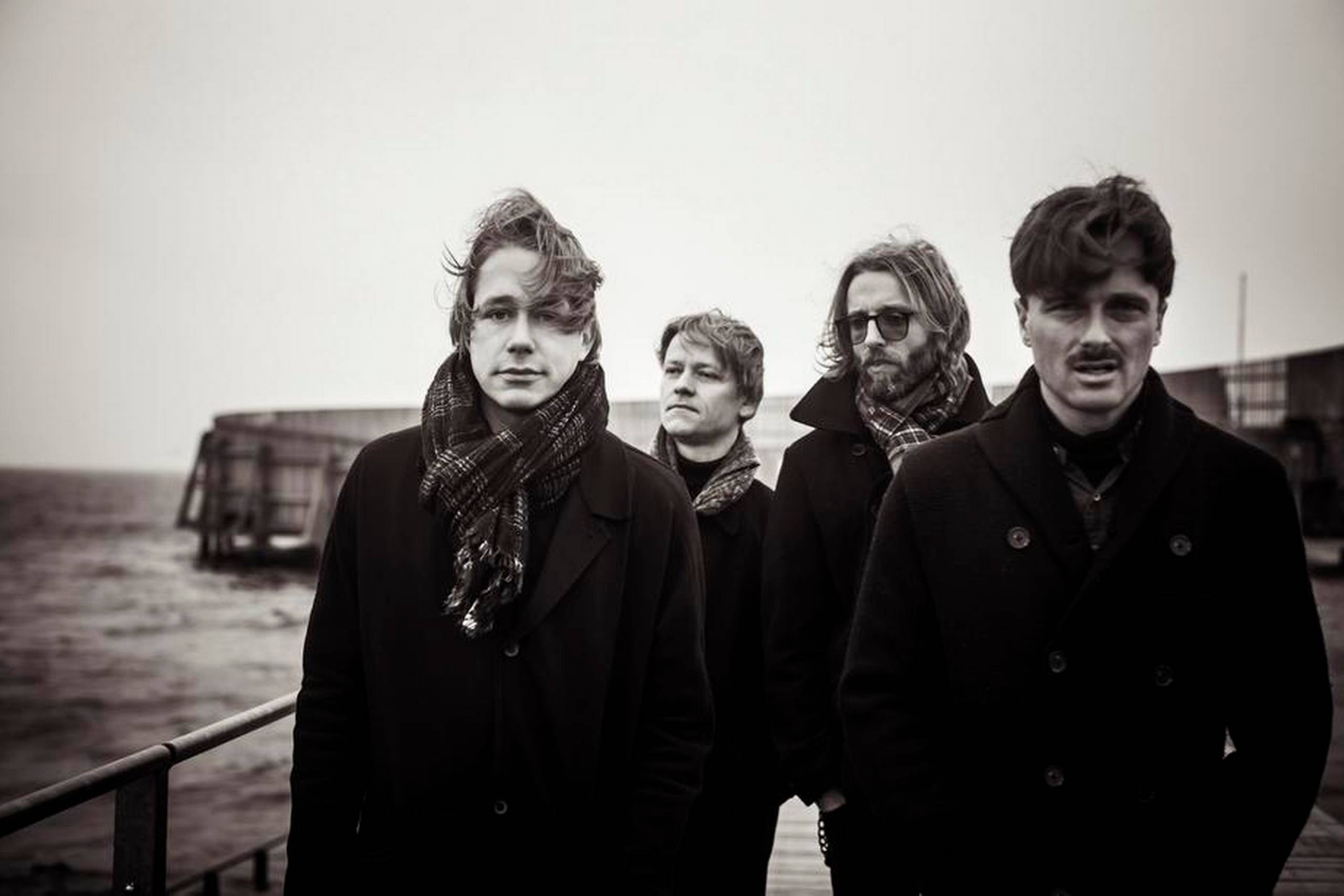 Jonas Bjerre, Silas Utke Graae Jørgensen, Johan Wohlert og Bo Madsen (th.) udgjorde Mew, da ”+ -” udkom. Senere forlod Bo Madsen gruppen. Pr-foto