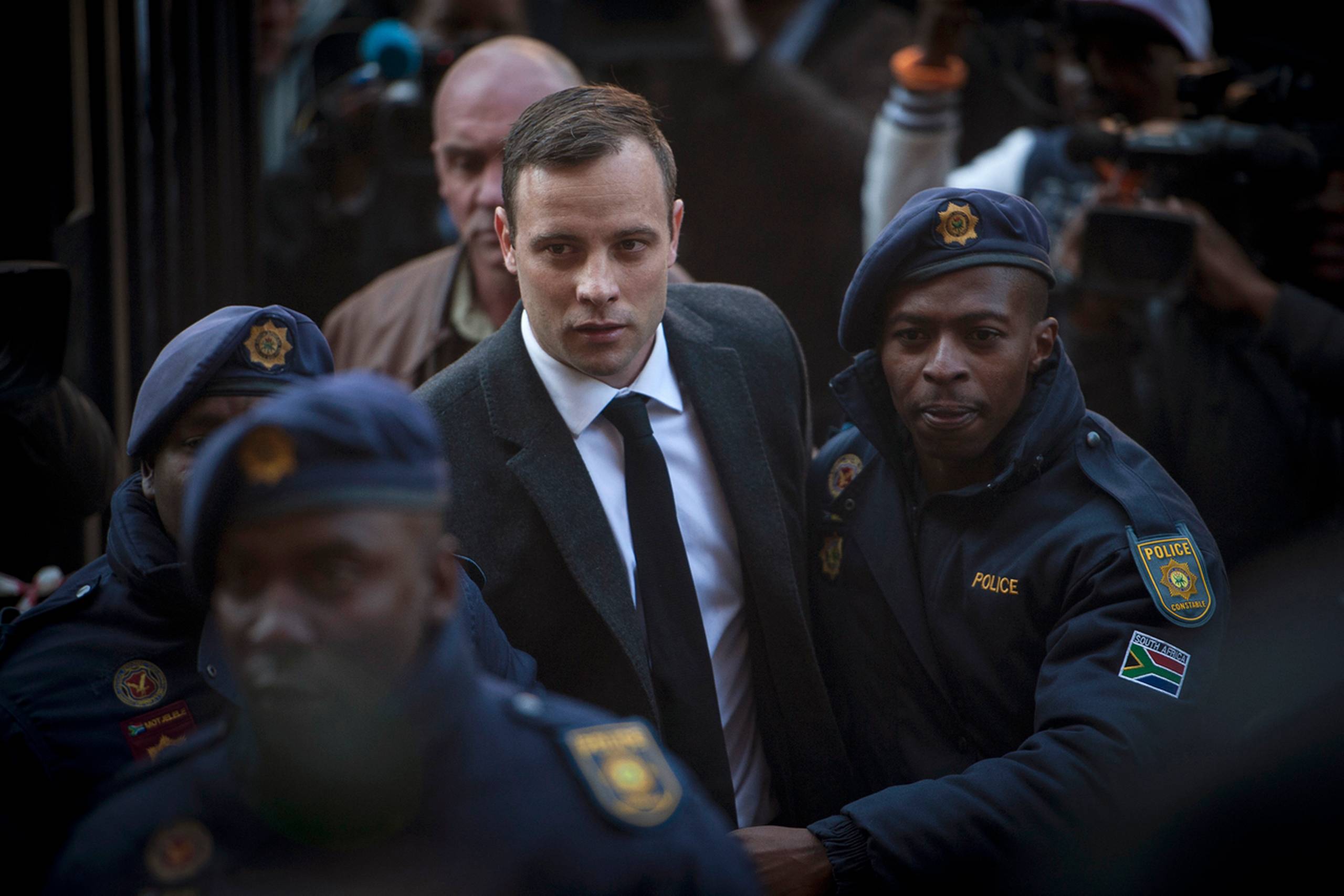 Oscar Pistorius ankommer til High Court i Pretoria, Sydafrika. Foto: Shiraaz Mohamed/AP