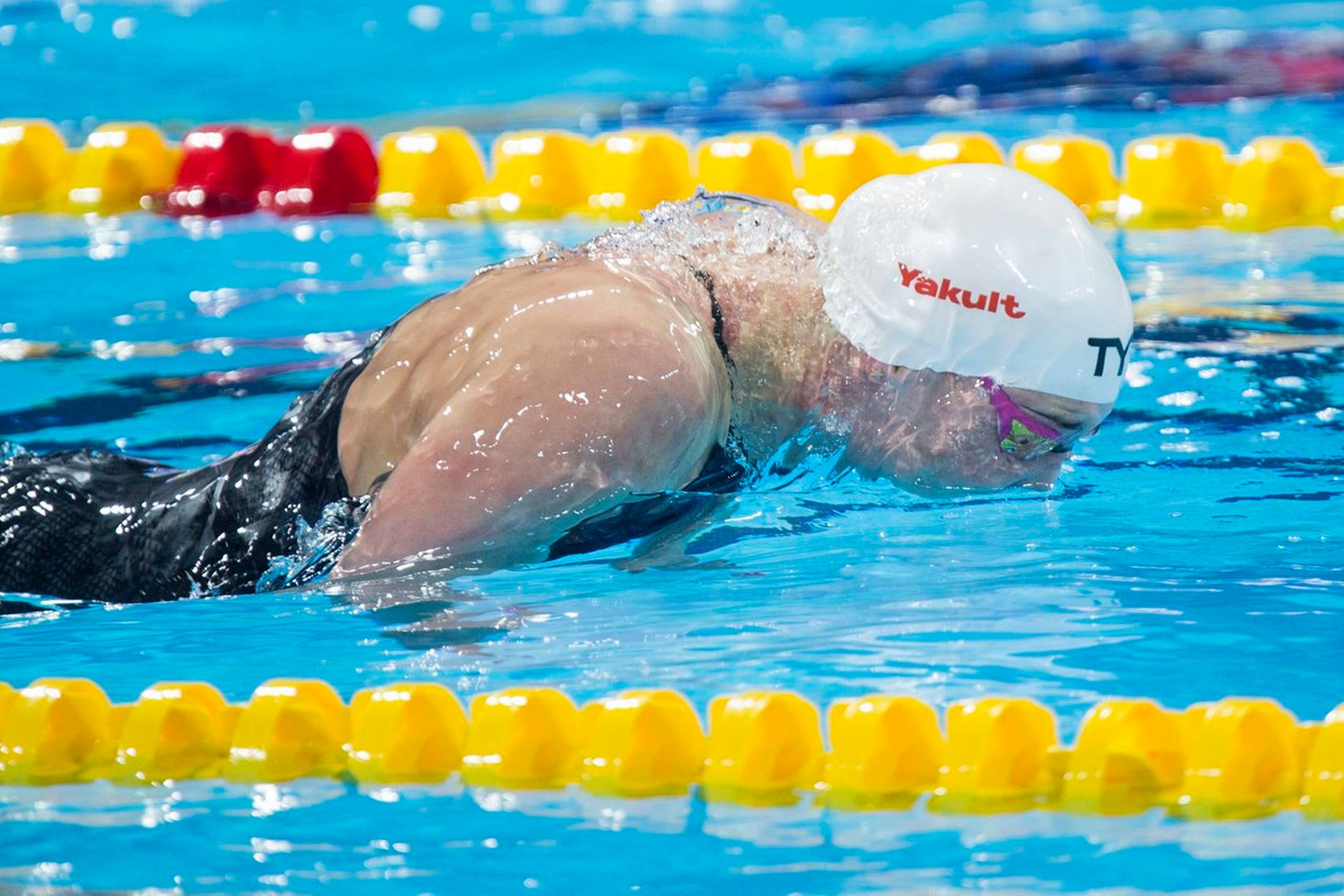 Jeanette Ottesen vandt guld i 50 meter butterfly ved svømme-VM på kortbane i Canada. Foto: Paul Chiasson/AP