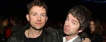 Damon Albarn (tv) og Noel Gallagher til Brit Awards i 2013. Foto: John Marshall/AP