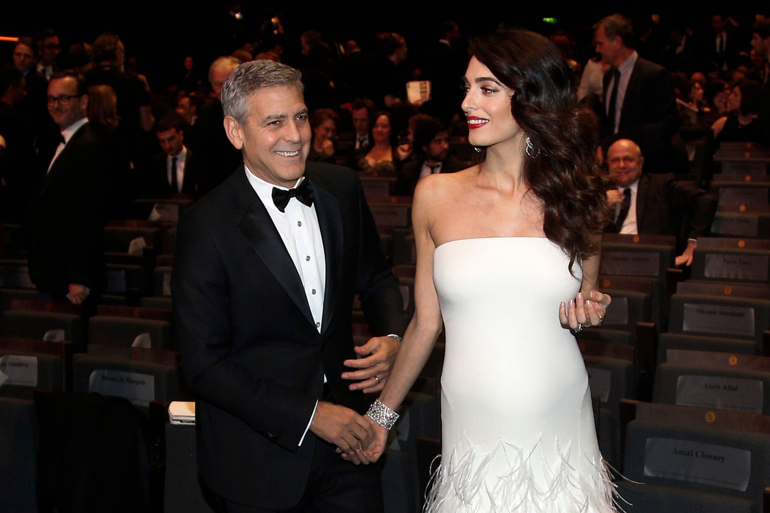 Amal Clooney og den Oscarvindende filmskuespiller, der blandt andet har medvirket i "Ocean's Eleven", blev gift i Italien i 2014. Brylluppet var med til at gøre dem til et af verdens mest berømte par. Foto: Thibault Camus