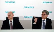 Siemens topchef Joe Kaeser (th.) ses her sammen med selskabet finansdirektør Ralf P. Thomas. Arkivfoto: Matthias Schrader/AP Photo.